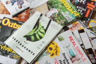 magazines scattered on a table