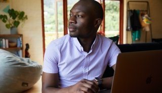 man-at-computer-using-healthcare-website